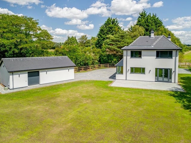 Looking back at the home from across the garden.