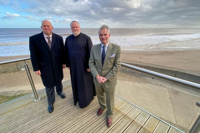 The sea is much calmer today - Coun Colin Davue, the Rev Richard Holden and the Lord-Lieutenant of Lincolnshire  Mr Toby Dennis.