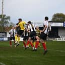 Stephen McCarron (no.4) heads home Brigg's fifth goal on Saturday. Photo: Anna Backstrom/Brigg Town FC.