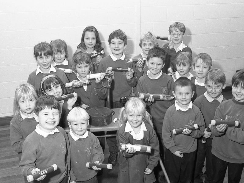 Pupils from Sibsey Primary School holding personal time capsules given to them by school trustees to bury in their gardens.