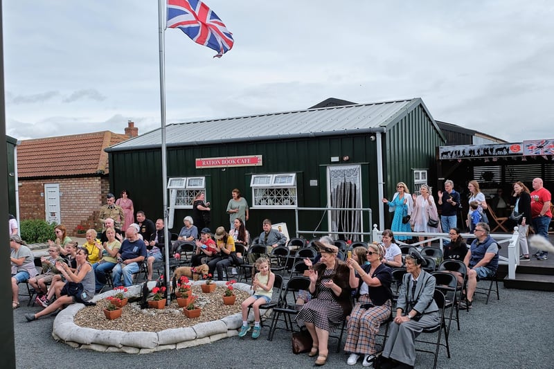 A crowd watching the stage performance.