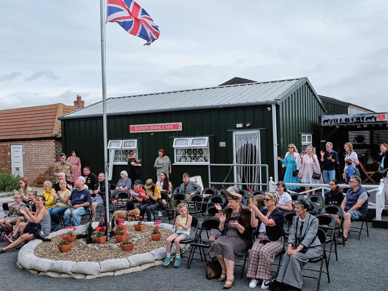 A crowd watching the stage performance.