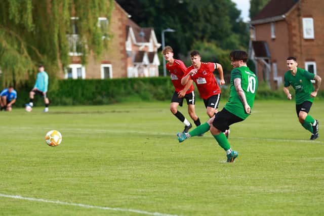 Ryan Lennon slots home one of his penalties at Pinchbeck. Photo: Steve W Davies Photography.