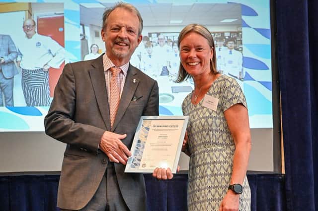 Louth Academy teacher Kate Coles is presented with her award by Simon Barrowcliff, Prime Warden of the Fishmongers’ Company, 2025 – 2026.