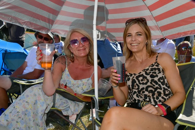 Dawn Wilson and Sarah Wilson-Leary enjoying the music in the shade.
