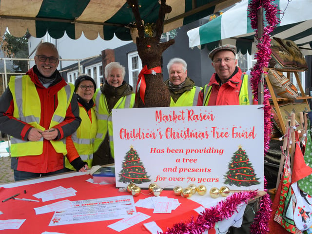All smiles from the Children’s Christmas Tree Committee members and helpers as they sold their raffle tickets