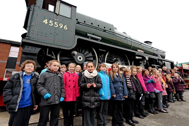 Youngsters from Horncastle Primary School are pictured in front of Bahamas, a visiting steam engine. The locomotive was in town as it was transported to Birmingham from its Yorkshire home for a major overhaul, backed by £776,000 of Heritage Lottery Fund cash. It visited Mortons printers and publishers, which had partly sponsored the journey. It was the first time a steam engine had been seen in Horncastle since 1964.