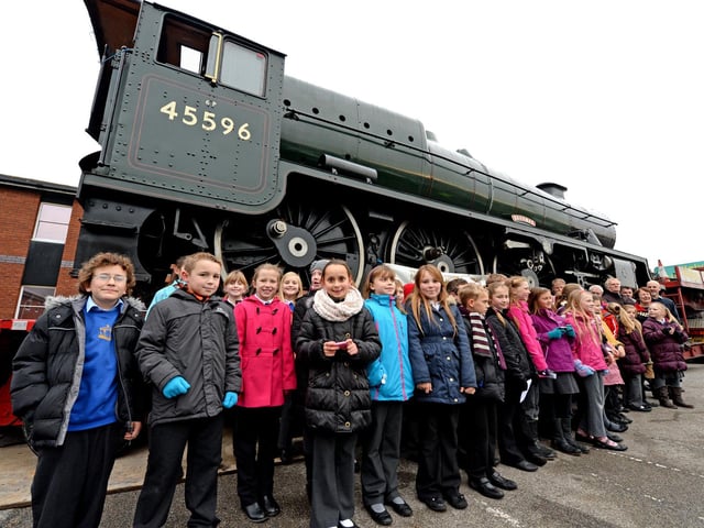 Youngsters from Horncastle Primary School are pictured in front of Bahamas, a visiting steam engine. The locomotive was in town as it was transported to Birmingham from its Yorkshire home for a major overhaul, backed by £776,000 of Heritage Lottery Fund cash. It visited Mortons printers and publishers, which had partly sponsored the journey. It was the first time a steam engine had been seen in Horncastle since 1964.