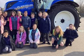 Redwood Primary School pupils welcome a visit from Leadenham farmer Andrew Ward and his tractor. Photo: LAS