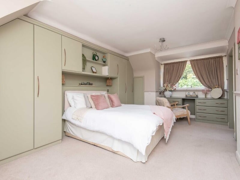 The principal bedroom and ...