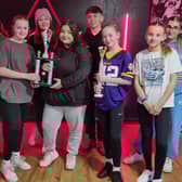 Top Limitz Dance Academy wirth their trophy for coming third in the 101 UK Championships. Caris Black (third right) proudly holds her trophy for becoming overall champion.