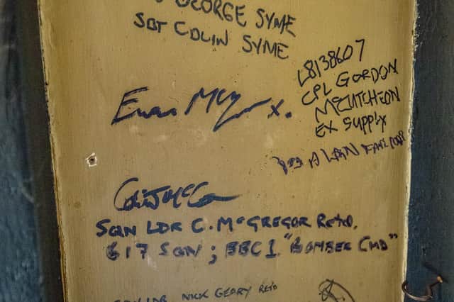 The 617 Dambusters and 627 Squadron signed the beams in the pub.