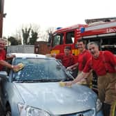 Lincolnshire's firefighters are ready to lather up and clean your car for charity.