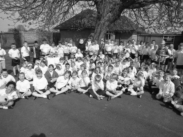 Carlton Road Primary School pupils taking a breather during a sponsored walk. The event was organised by the Parents and Staff Association in a bid to raise funds for the school. It involved all pupils making laps around the playground.