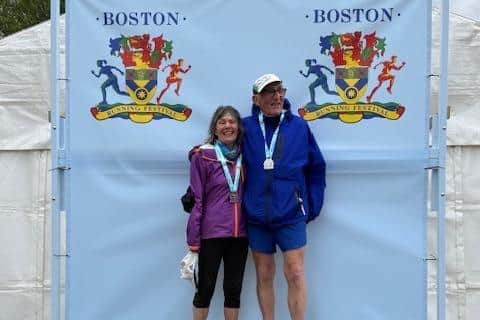 Marathon winners Lizzie Keep and David Webster on the podium.