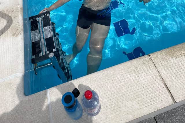 Andrew Short completing a sponsored swim at Jubilee Park in Woodhall Spa.