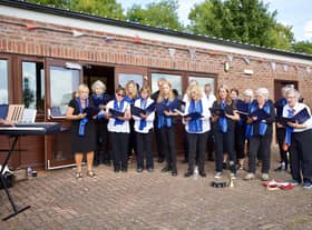 Minting Community Choir performing at the motorshow.
