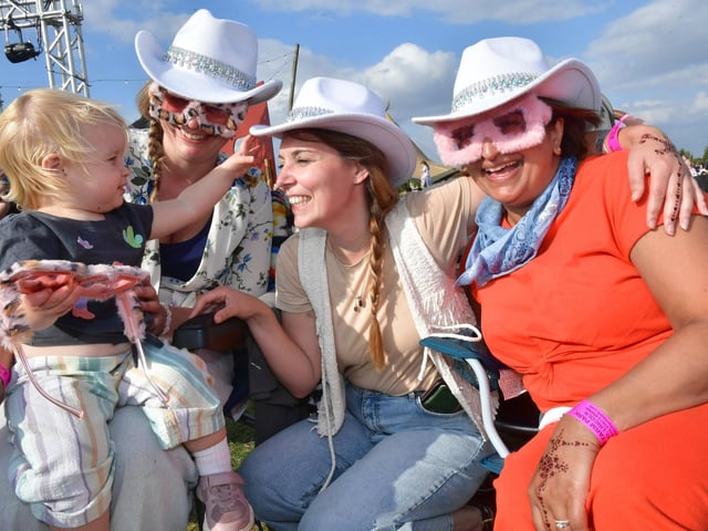 Fancy hats and glasses were all part of the fun for one-year toddler Margot Newberry-Phillips, who is pictured with (from left) Anya Mayor, Naomi Newberry and Shasha Gupta, all of Keyworth.