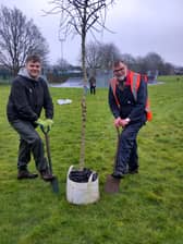 Coun Stephen Bunny gets involved in the planting (right).