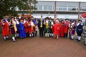 ​All the town crier contestants with, at the centre, winner David Summers, Mayor David Suiter, Sleaford Town Crier John Griffiths and president of the Loyal Company, Brenda Willison.