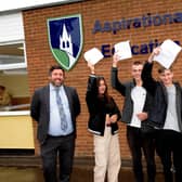 Louth Academy GCSE students and Principal Philip Dickinson.