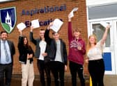 Louth Academy GCSE students and Principal Philip Dickinson.