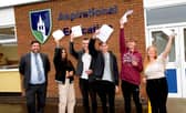 Louth Academy GCSE students and Principal Philip Dickinson.