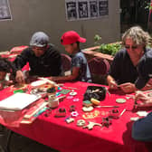 Members of the community taking part in a previous art session for the Dolphin Lane project.