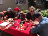 Members of the community taking part in a previous art session for the Dolphin Lane project.