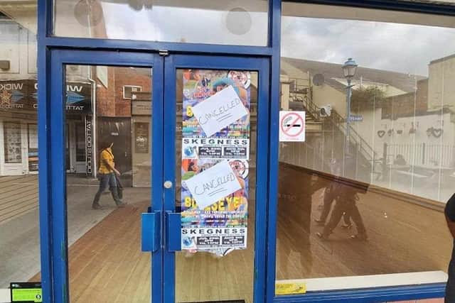 The poster on a window of one of the shops at Hildreds Shopping Centre.