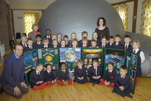 Starlincs Mobile Planetarium visited Bicker Preparatory School pupils 10 years ago to teach them about the night’s sky. Pictured with youngsters are Planetarium owner Mick Mortan and Julie Myles, class three teacher, (left) and Jo Hubbert, reception class teacher.