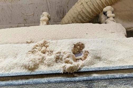 Dust found behind the crosscut saw and bench at The Furniture Chest workshop, Heckington. Photo: HSE