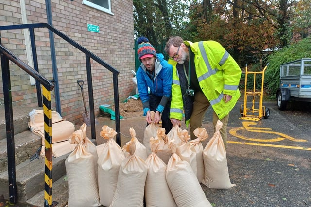 Councillors and volunteers filled sandbags