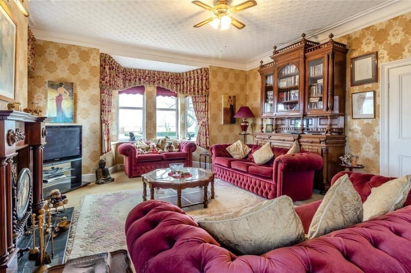 The reception room at the front of the property.