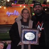 Hollie and Ryan Blankley of Watergate Yard with their winners' plaque.