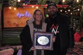Hollie and Ryan Blankley of Watergate Yard with their winners' plaque.