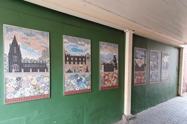 Praised, a Sleaford and District Civic Trust award for the new mosaics in Gladstone's Yard passageway.
