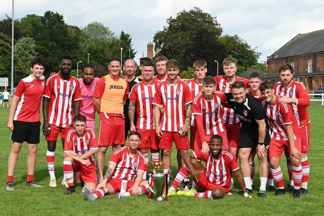 Horncastle Town celebrate their Hotchkin Cup win. Photo: Rob Savage.