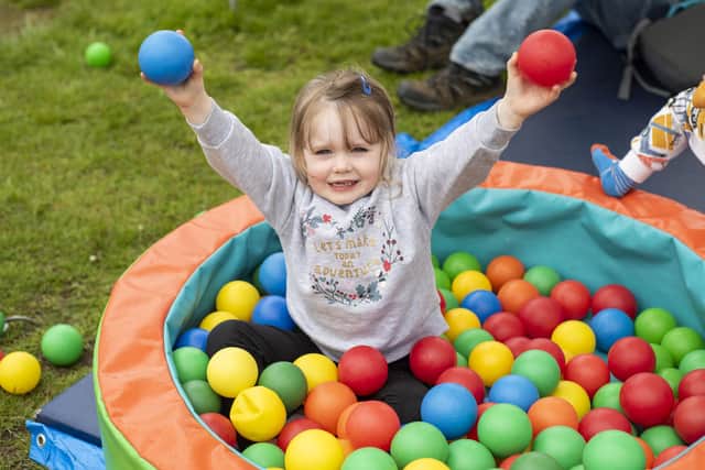 Niamh Dellar, 3, enjoys the ball pit at Horncastle's Coronation event.