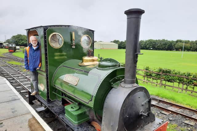 Rob Nicholls on the footplate of the LCLR’s steam locomotive Jurassic. Photo: Geoff Hankin/LCLR