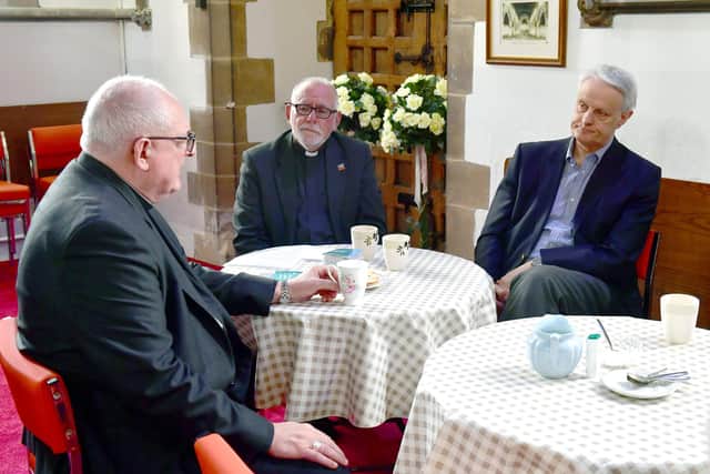 The Bishop (left) discusses local issues with the Archdeacon of Lincoln, the Ven Gavin Kirk, and Robert Caudwell, chair Lowland Agricultural Peat Task Force at DEFRA.  Friskney,
