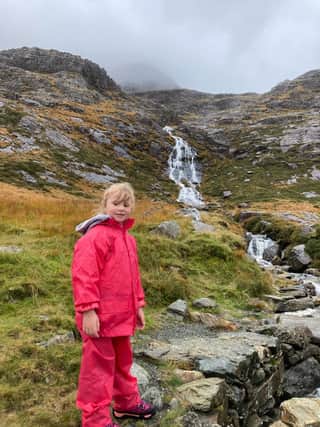 Bethany Walker, 5, climbs Mt Snowdon.