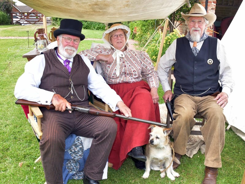 It's a dog's life at Turkey Creek with (from left) Tom Cutts, Pauline Cutts, Peter Rice and ‘Treddie. The dog.