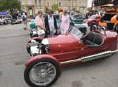Sisters Val Gray, Sue Brain and Pauline Collett of Helpringham admiring a Morgan three-wheeler sports car at last year's show.