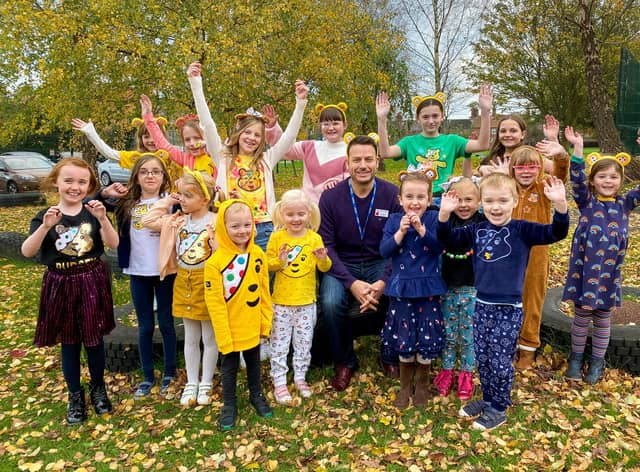 Headteacher Mr Lidbury and pupils from Kidgate Primary School in Louth celebrate Children in Need.