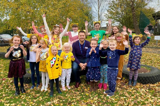 Headteacher Mr Lidbury and pupils from Kidgate Primary School in Louth celebrate Children in Need.