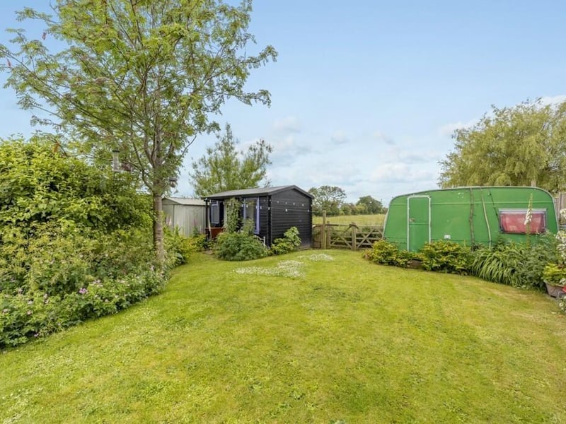 The garden studio and caravan.