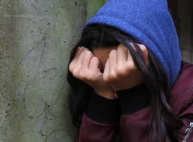 PICTURE POSED BY MODEL of a teenage girl with her head in her hands showing signs of mental health issues. PA Photo. Picture date: Sunday February 2, 2020. Photo credit should read: Gareth Fuller/PA Wire