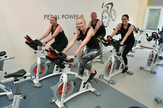 Sara Richards, owner of Pedal Power (centre), with members Karen Chamberlain, Colin Chamberlain, and Jade Smith. Photo: D.R.Dawson Photography
