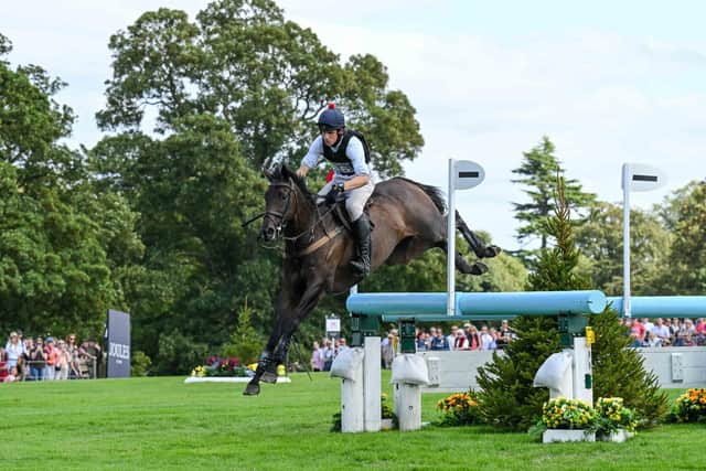 Tom Strawson riding Public Address during the cross country phase of the Defender Burghley Trophy.